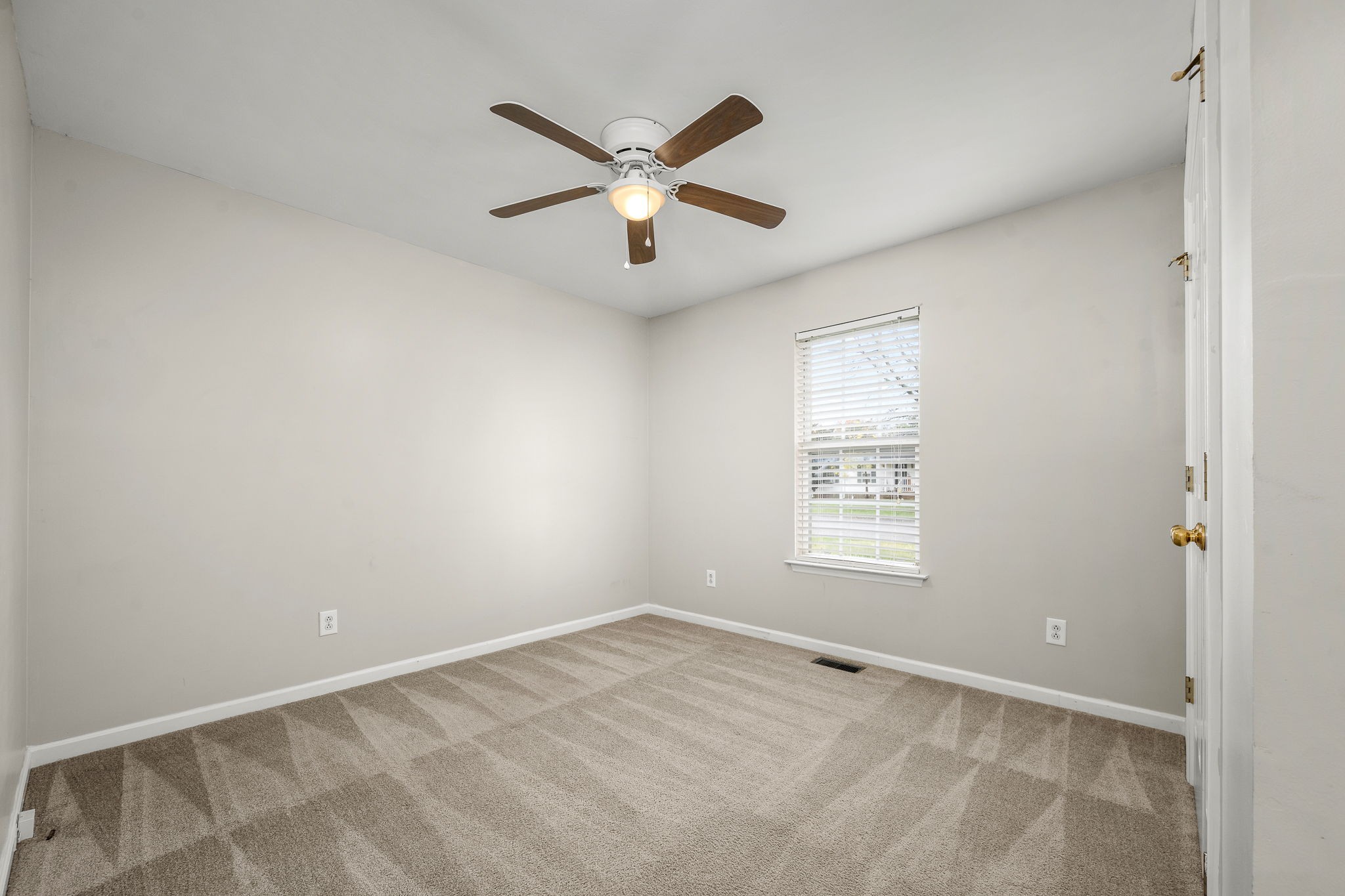 2403 Medford Campbell Boulevard Murfreesboro, TN 37127 - Photo 22 of 35 a view of an empty room with a window