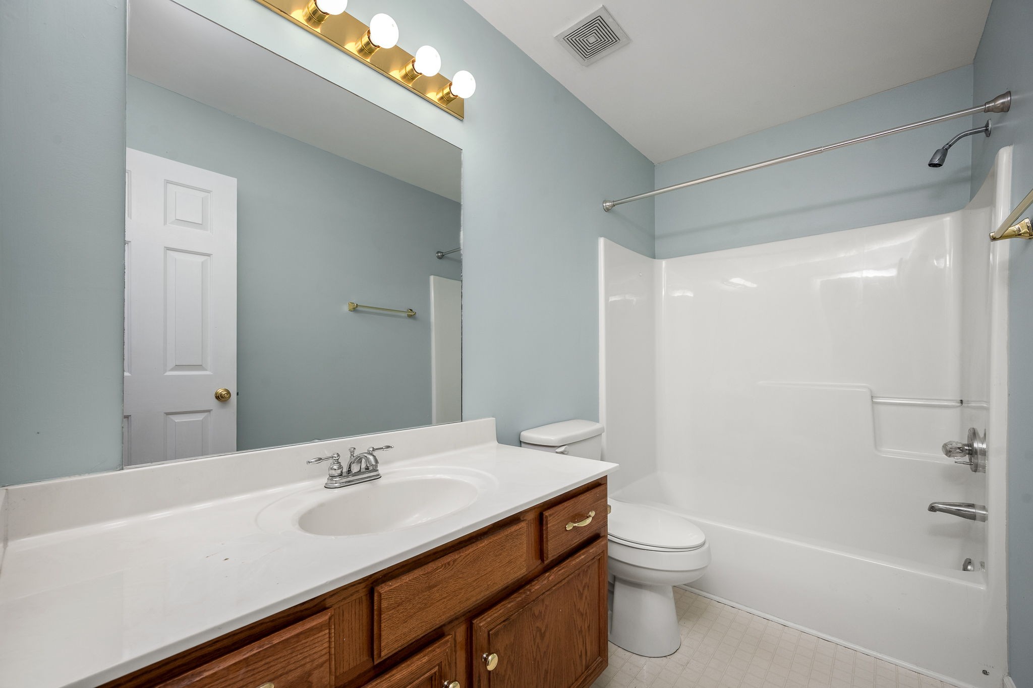 2403 Medford Campbell Boulevard Murfreesboro, TN 37127 - Photo 24 of 35 a bathroom with a sink a toilet and shower