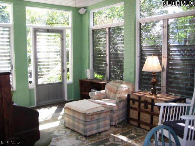 2989 Glengary Road Cleveland, OH 44120 - Photo 10 of 25 OPENS TO WINDOWED SUN ROOM