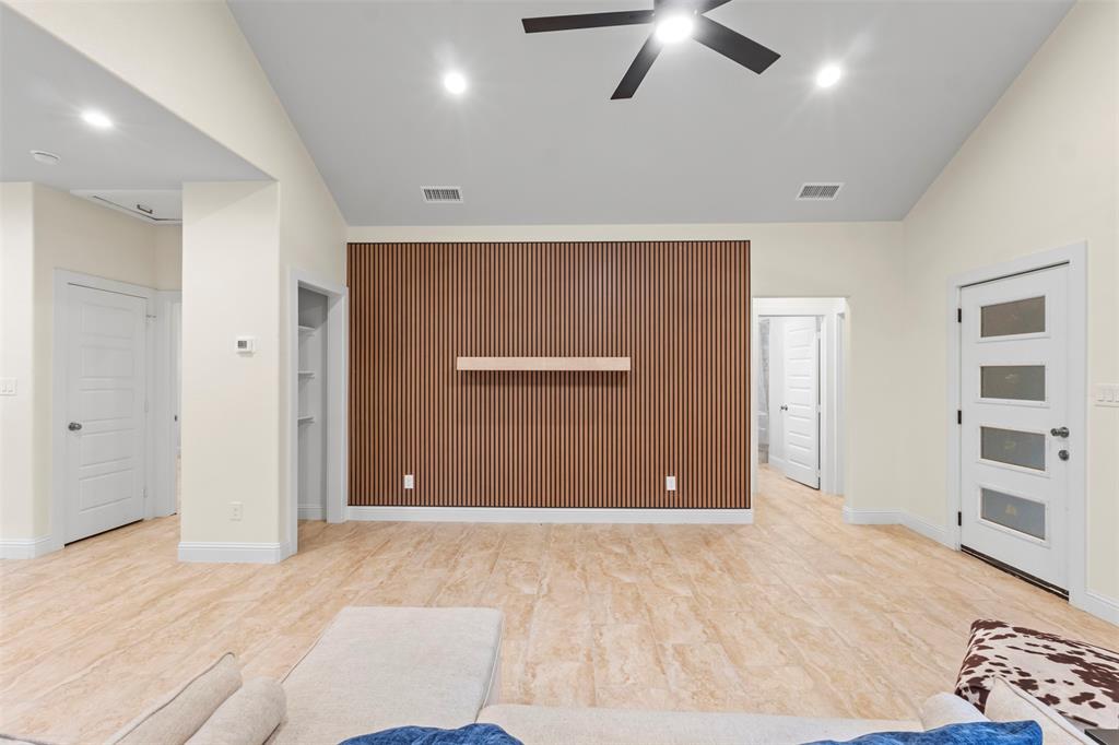 117 Pawnee Trail Mabank, TX 75156 - Photo 13 of 40 a view of empty room with a ceiling fan
