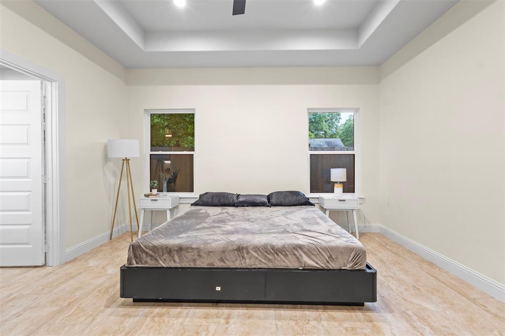 117 Pawnee Trail Mabank, TX 75156 - Photo 25 of 40 a bedroom with a bed and a window