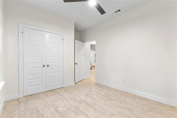 an empty room with a empty space and a window