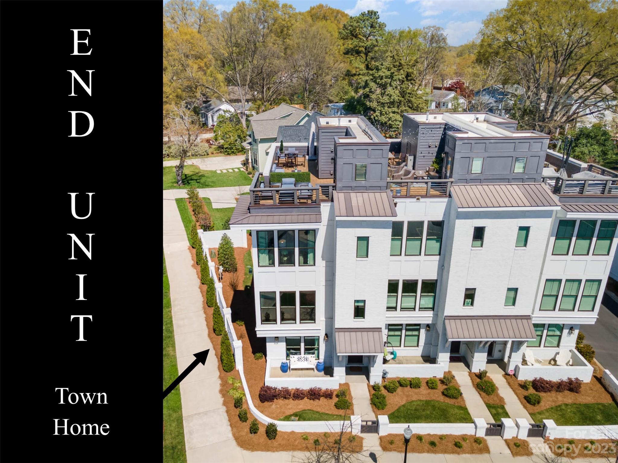 a aerial view of a residential apartment building with a street
