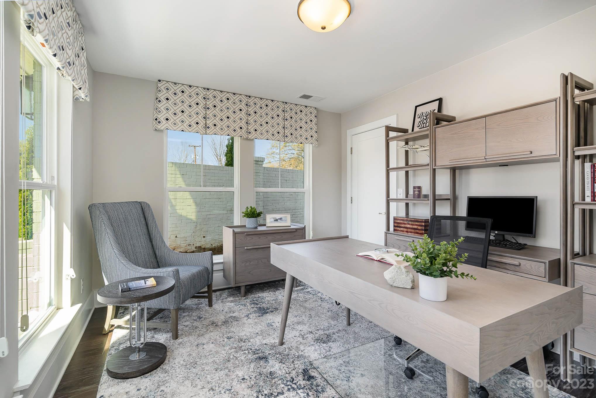 1103 Reece Road Charlotte, NC 28209 - Photo 16 of 32 a view of a livingroom with furniture and a window