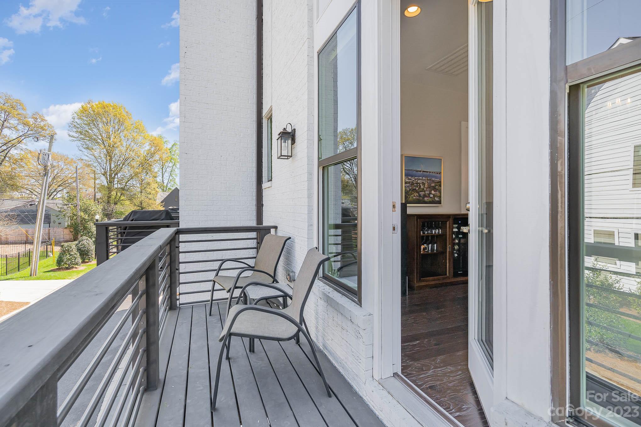 1103 Reece Road Charlotte, NC 28209 - Photo 26 of 32 a view of balcony and patio