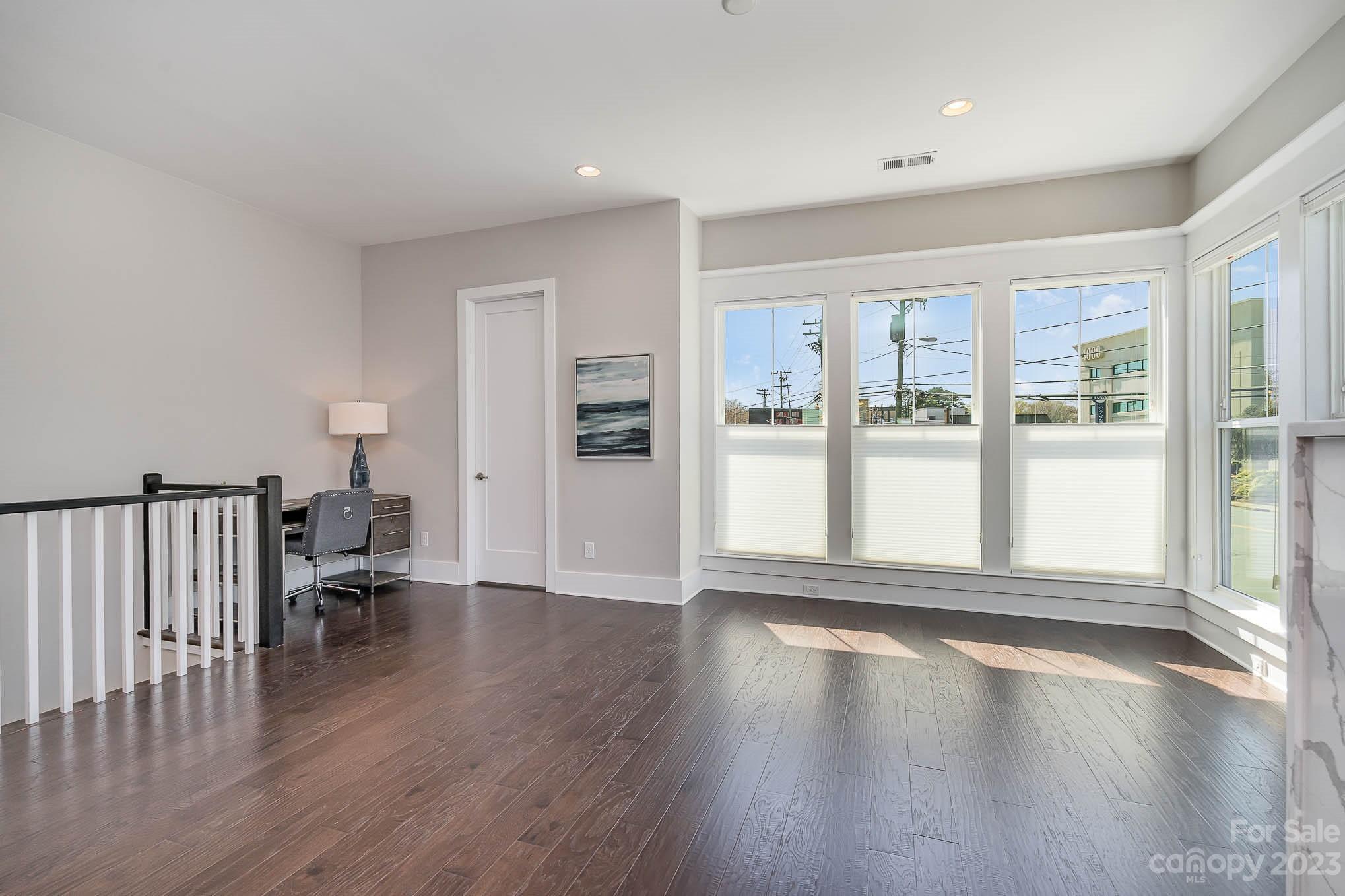 1103 Reece Road Charlotte, NC 28209 - Photo 9 of 32 a view of an empty room with a window