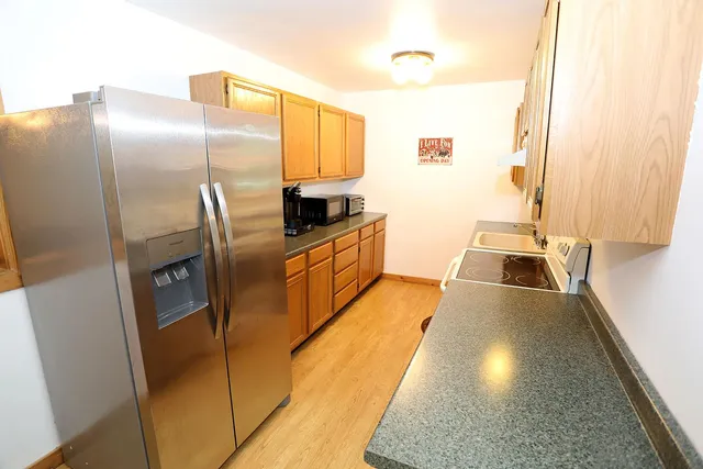 a kitchen with a stove and a sink