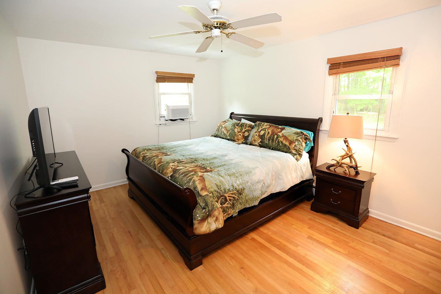 342 Bernas Road Cochecton, NY 12726 - Photo 37 of 48 a large bed sitting in a bedroom next to a window