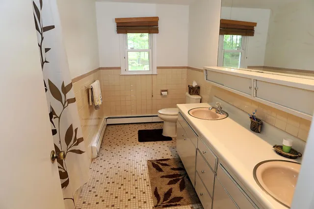 a view of a yard with a street sign