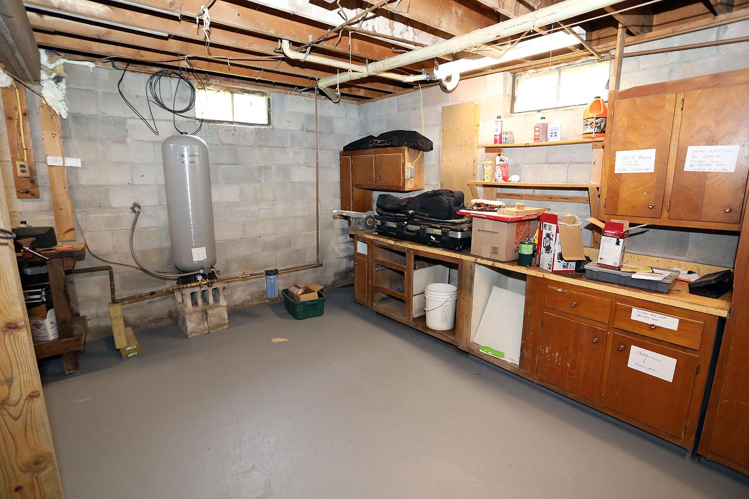 342 Bernas Road Cochecton, NY 12726 - Photo 44 of 48 a kitchen with blue cabinets and a stove