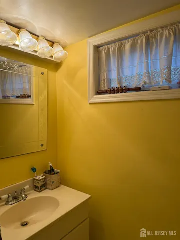 a kitchen with stainless steel appliances granite countertop a stove a refrigerator and cabinets