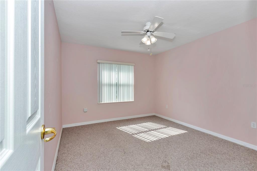 6793 Southwest 111th Loop Ocala, FL 34476 - Photo 29 of 47 Guest bedroom