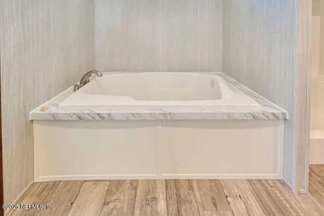 a bathroom with a bathtub