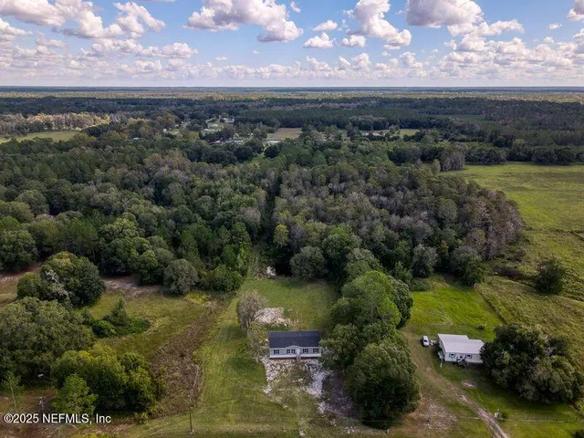 a view of a city with mountains in the background