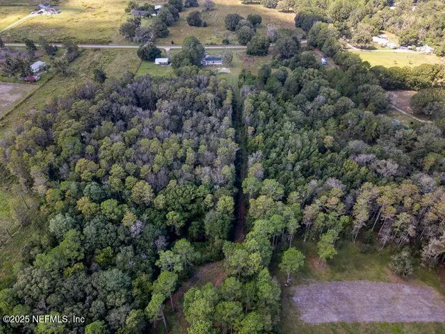 an aerial view of house with outdoor space