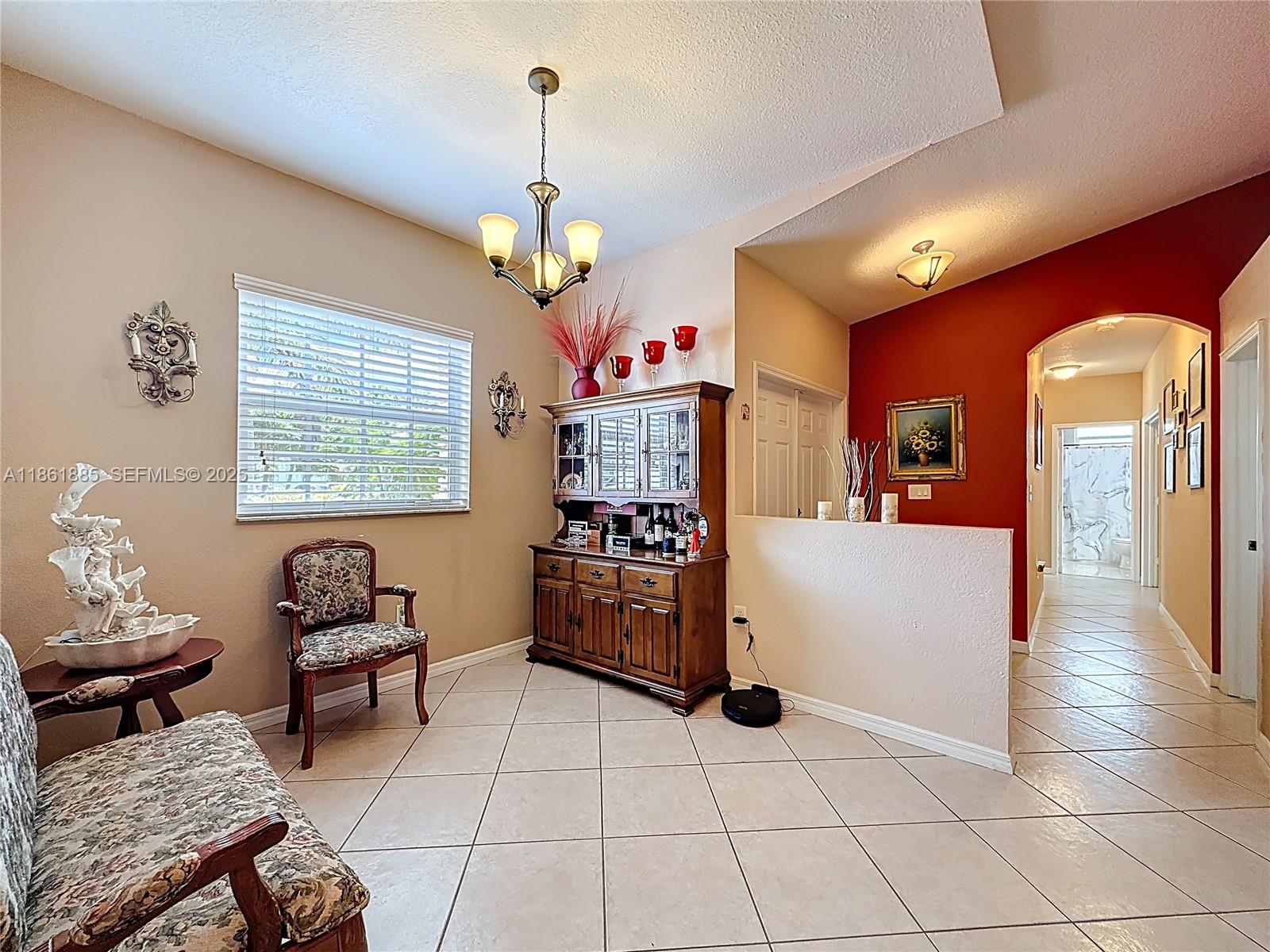 30030 Southwest 154th Avenue Homestead, FL 33033 - Photo 15 of 70 a very nice looking room with a large window