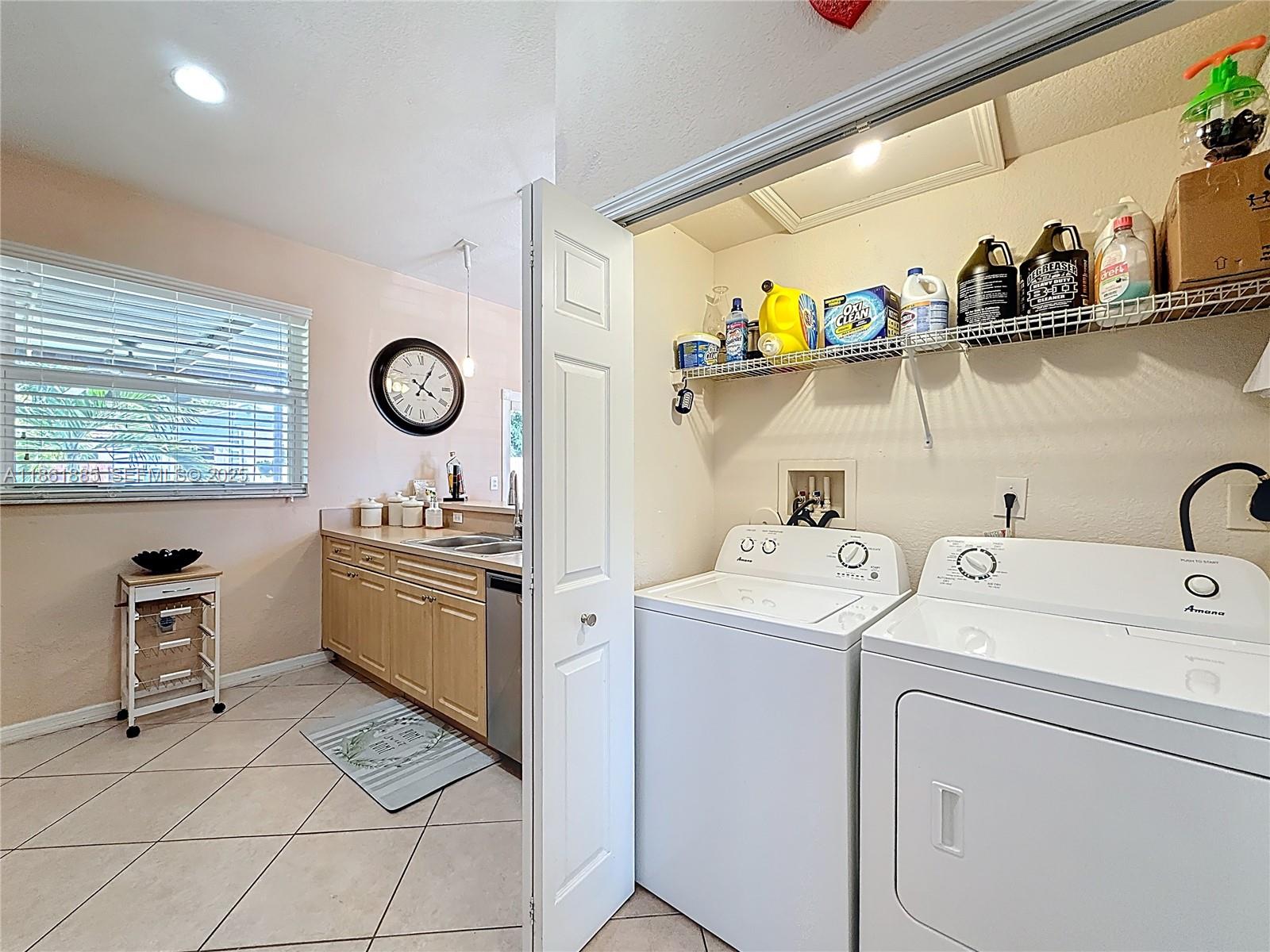 30030 Southwest 154th Avenue Homestead, FL 33033 - Photo 47 of 70 a room with a washing machine and sink