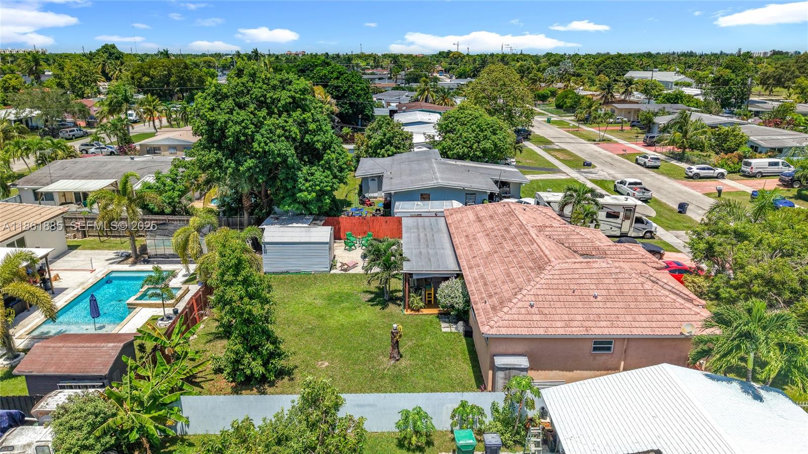 30030 Southwest 154th Avenue Homestead, FL 33033 - Photo 60 of 70 an aerial view of a house with a yard and lake view