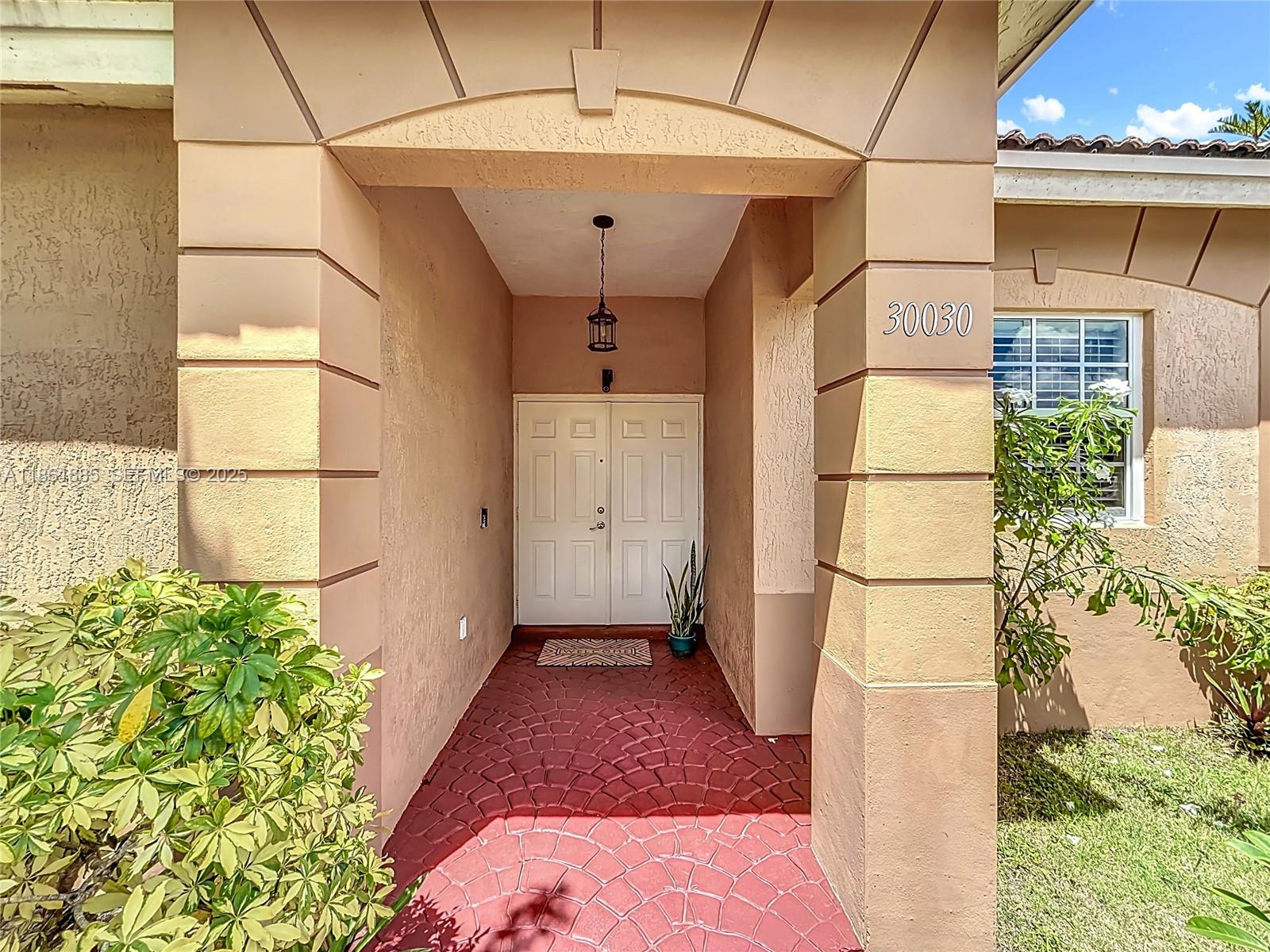 30030 Southwest 154th Avenue Homestead, FL 33033 - Photo 10 of 70 a view of a garage