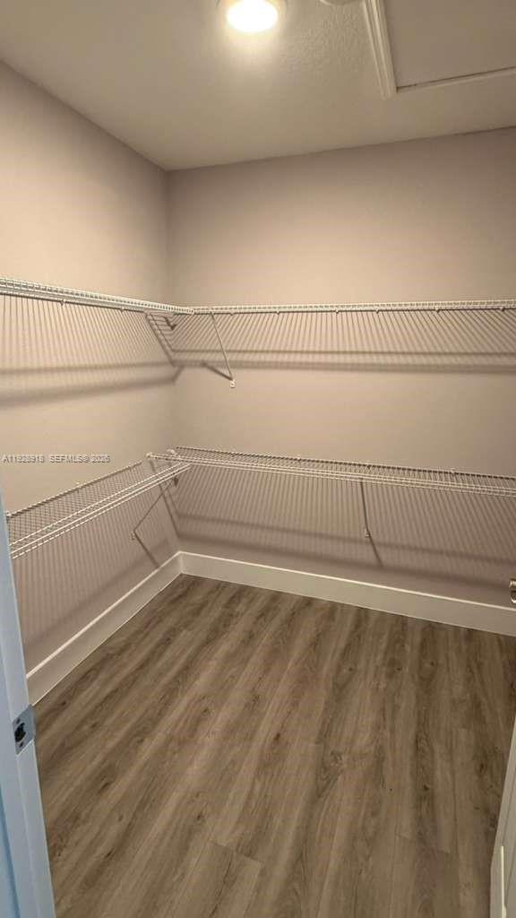 6805 Heavitree Drive Sebring, FL 33876 - Photo 19 of 61 a view of a room with racks on the wall