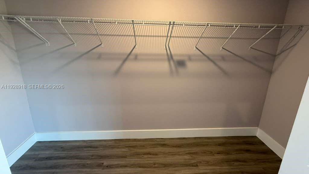 6805 Heavitree Drive Sebring, FL 33876 - Photo 25 of 61 a view of a room with wooden floor