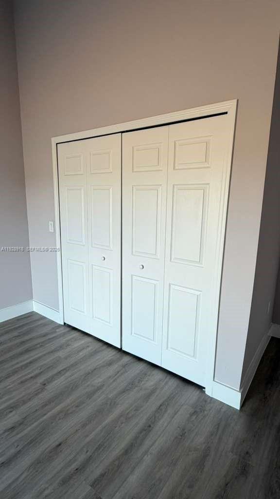 6805 Heavitree Drive Sebring, FL 33876 - Photo 32 of 61 a view of an empty room with wooden floor