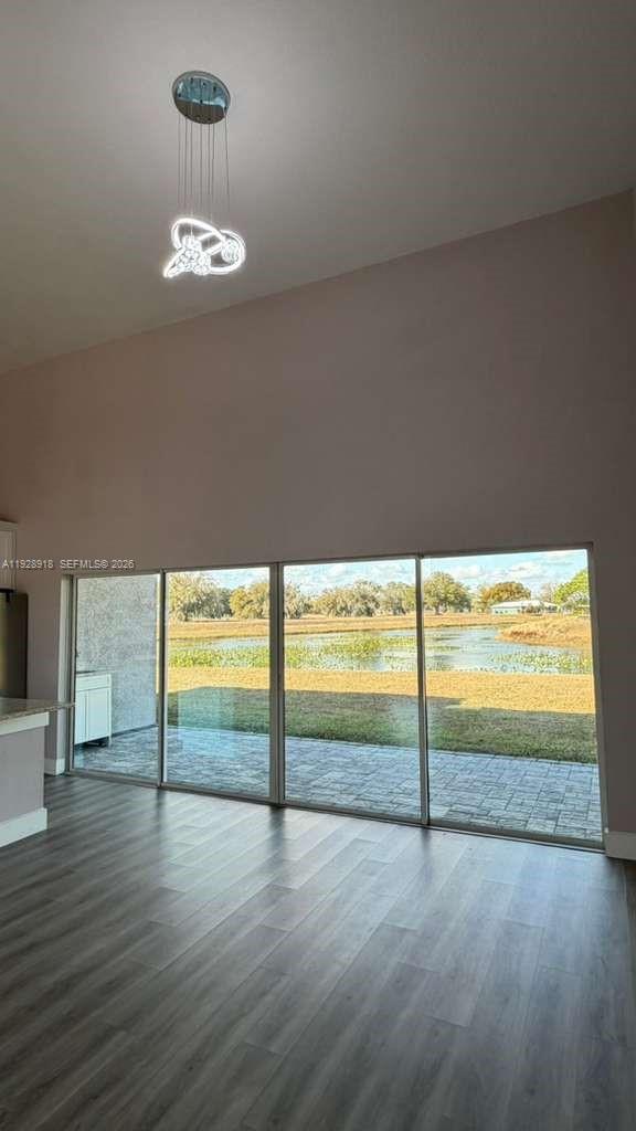 6805 Heavitree Drive Sebring, FL 33876 - Photo 37 of 61 a view of an empty room and wooden floor