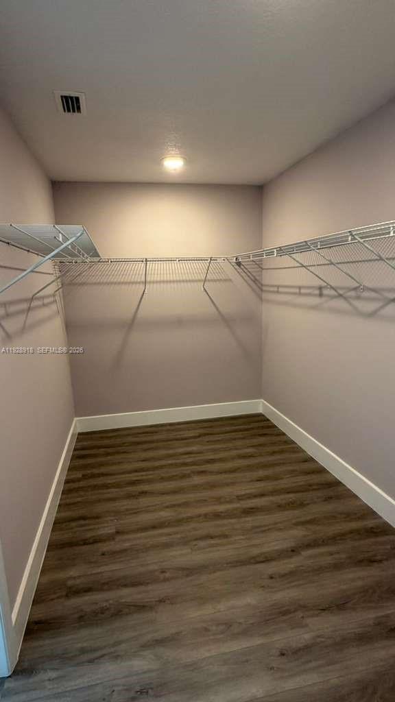 6805 Heavitree Drive Sebring, FL 33876 - Photo 44 of 61 a view of an empty walk in closet