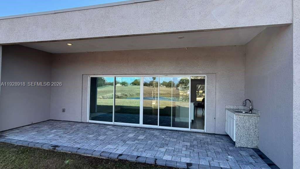 6805 Heavitree Drive Sebring, FL 33876 - Photo 56 of 61 a view of a room with a large window