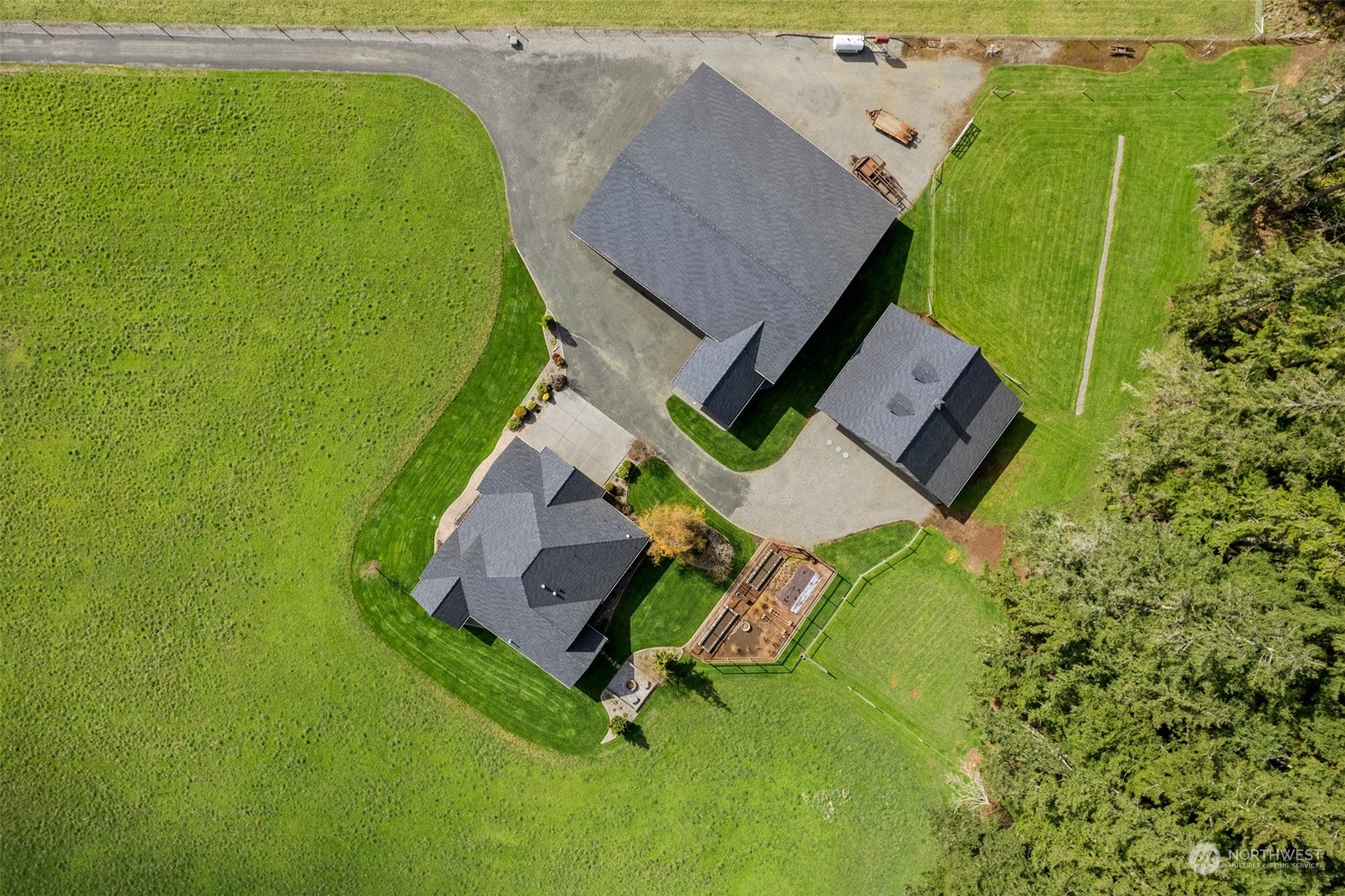9336 James Road Southwest Rochester, WA 98579 - Photo 3 of 40 an aerial view of a house with a swimming pool