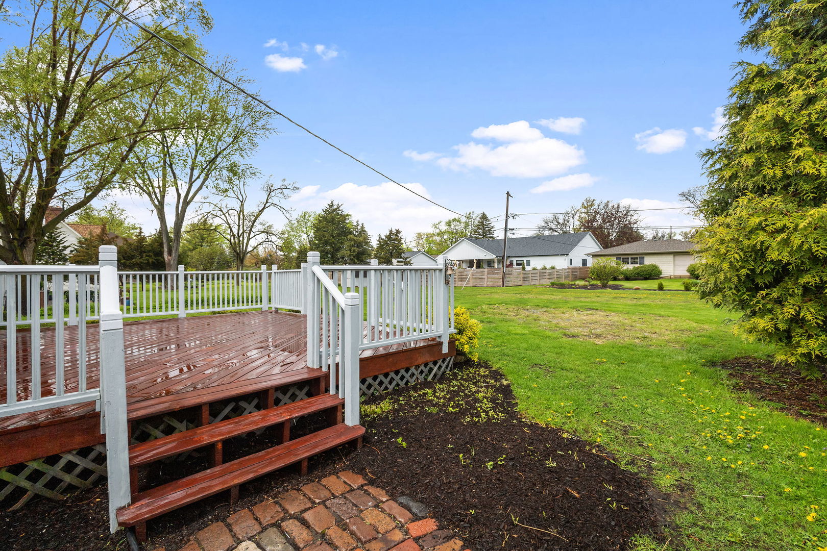 646 68th Street Willowbrook, IL 60527 - Photo 21 of 27 a view of a garden with a slide