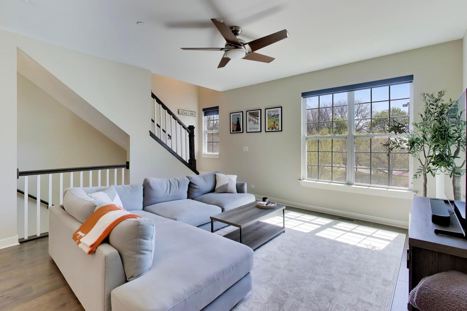 1623 Church Street Evanston, IL 60201 - Photo 5 of 29 a living room with furniture and a window