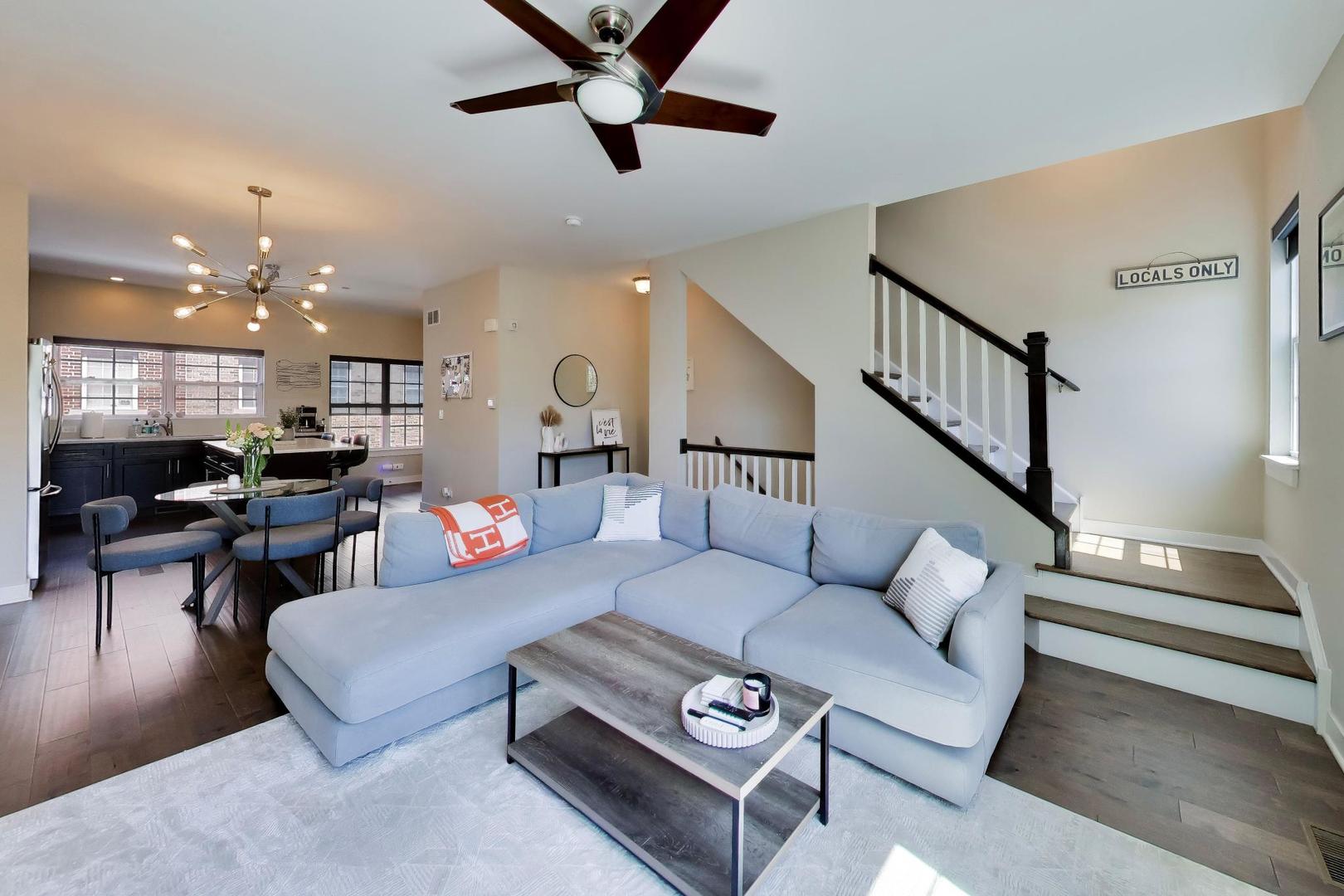 1623 Church Street Evanston, IL 60201 - Photo 6 of 29 a living room with furniture and a view of kitchen