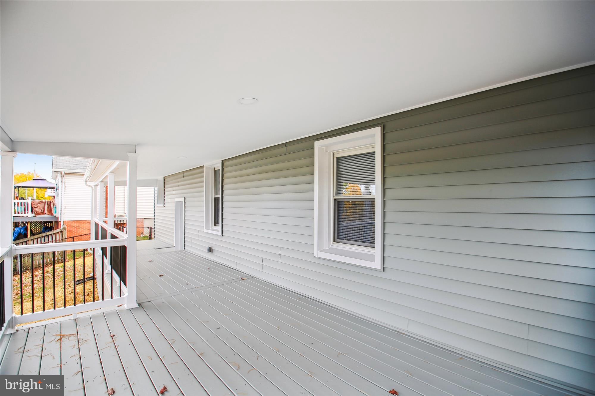 106 Charles Road Linthicum Heights, MD 21090 - Photo 12 of 44 a view of a house with a deck