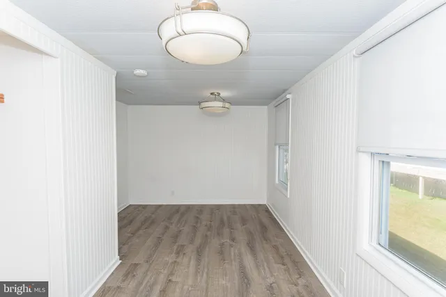 a view of swimming pool with sitting area