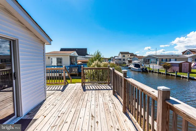 a kitchen with stainless steel appliances a refrigerator and a stove top oven