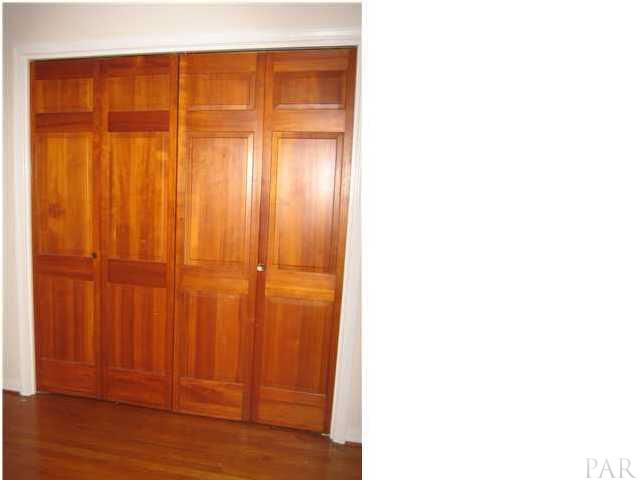 7864 Templeton Road Pensacola, FL 32506 - Photo 16 of 20 Additional bedroom picture of the closet. All bedrooms have nice closet doors like this one.
