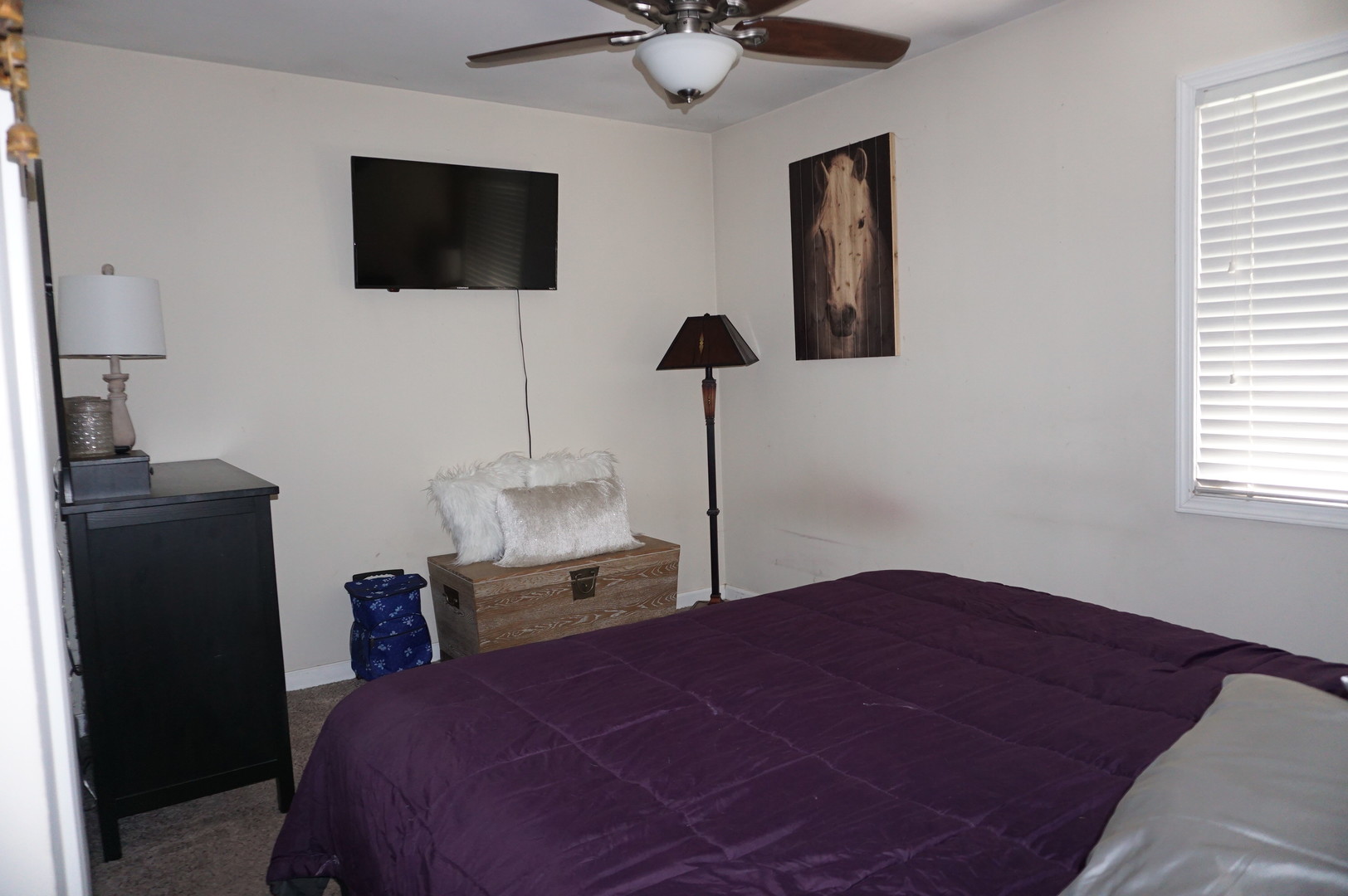 221 Healy Avenue Romeoville, IL 60446 - Photo 11 of 13 a bedroom with a bed and a flat screen tv