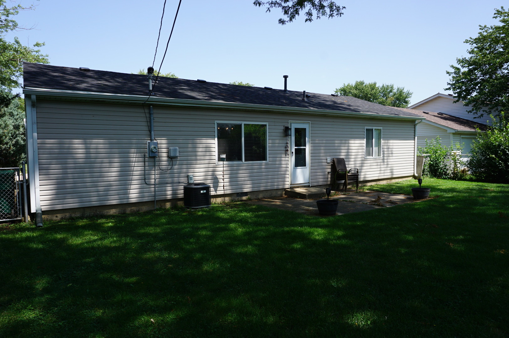 221 Healy Avenue Romeoville, IL 60446 - Photo 13 of 13 a view of a house with a yard