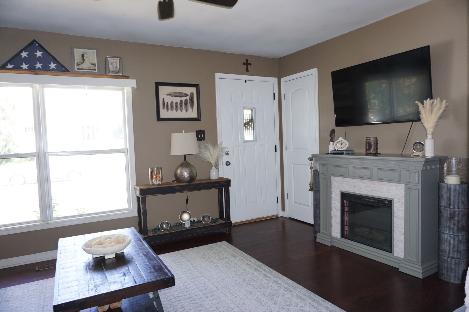 221 Healy Avenue Romeoville, IL 60446 - Photo 6 of 13 a living room with furniture and a flat screen tv