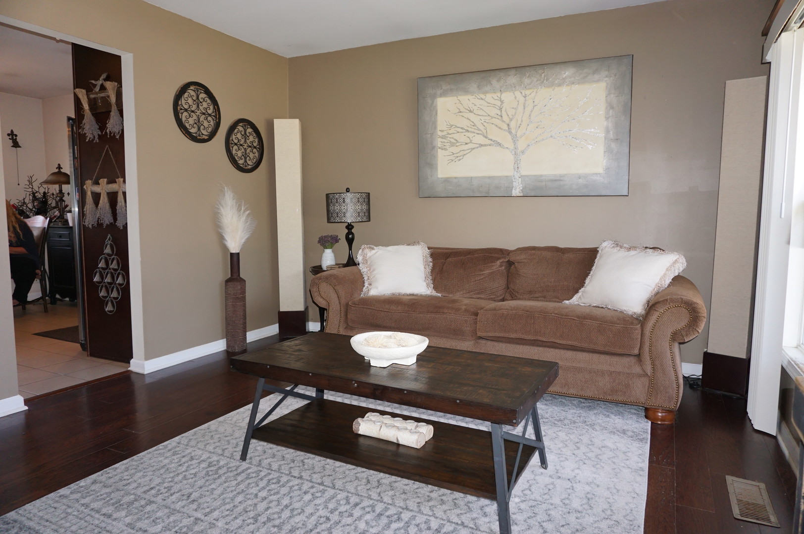 221 Healy Avenue Romeoville, IL 60446 - Photo 8 of 13 a living room with furniture and a table