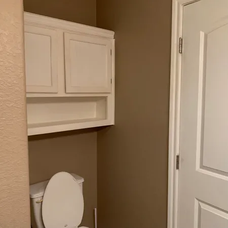 a bathroom with a toilet