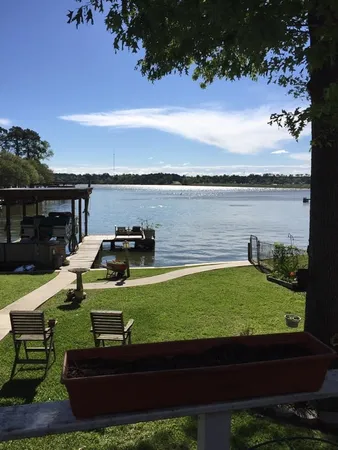 a view of a lake with a garden