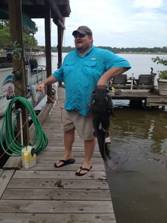 a view of a lake with sitting area