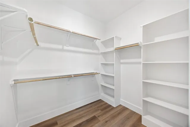 a view of an empty walk in closet