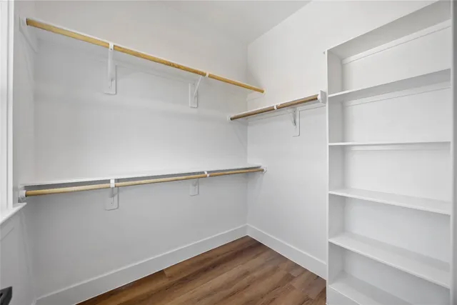 a view of an empty walk in closet