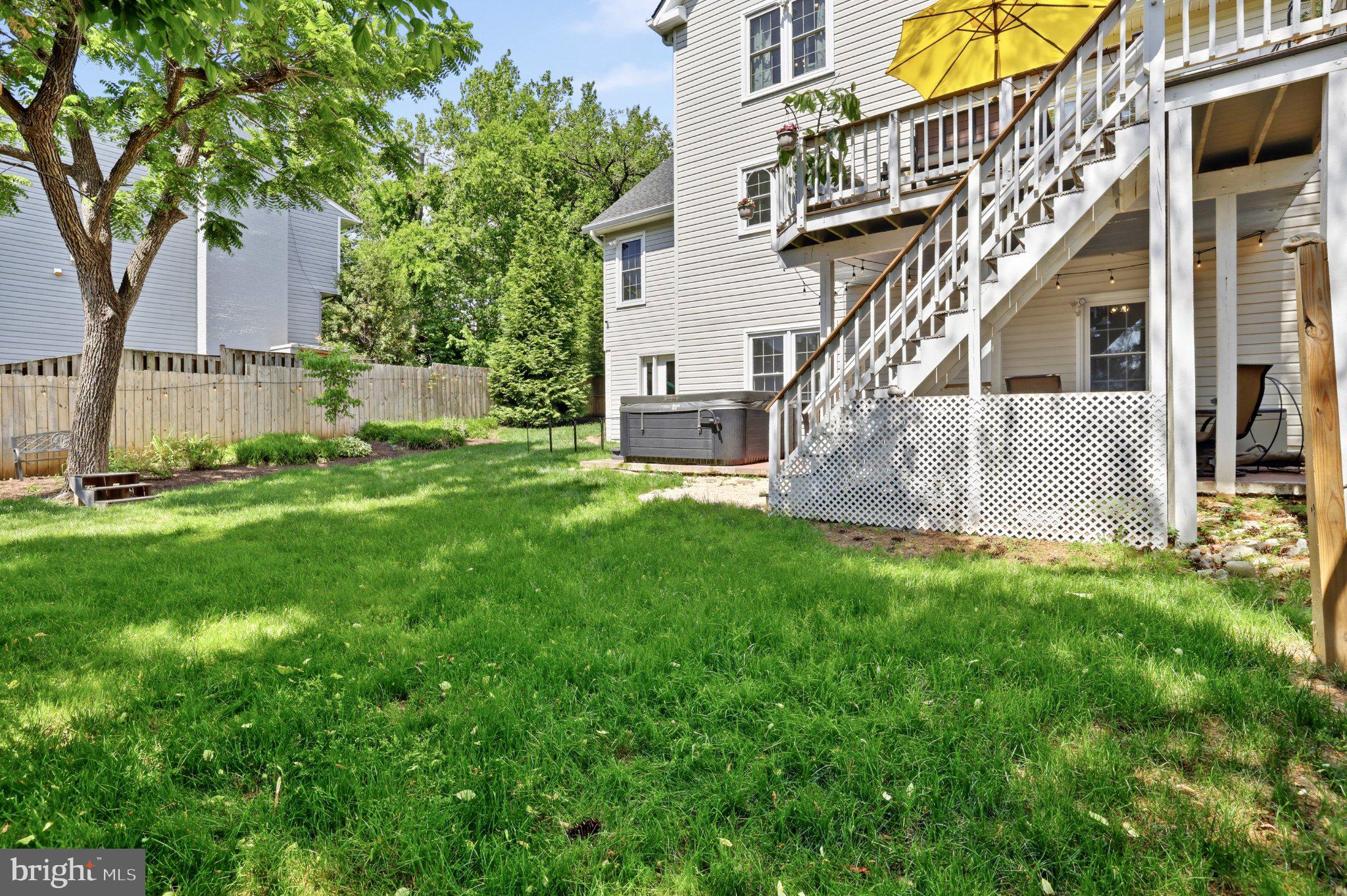6732 Churchill Road McLean, VA 22101 - Photo 54 of 61 Sunny backyard oasis with lush greenery.