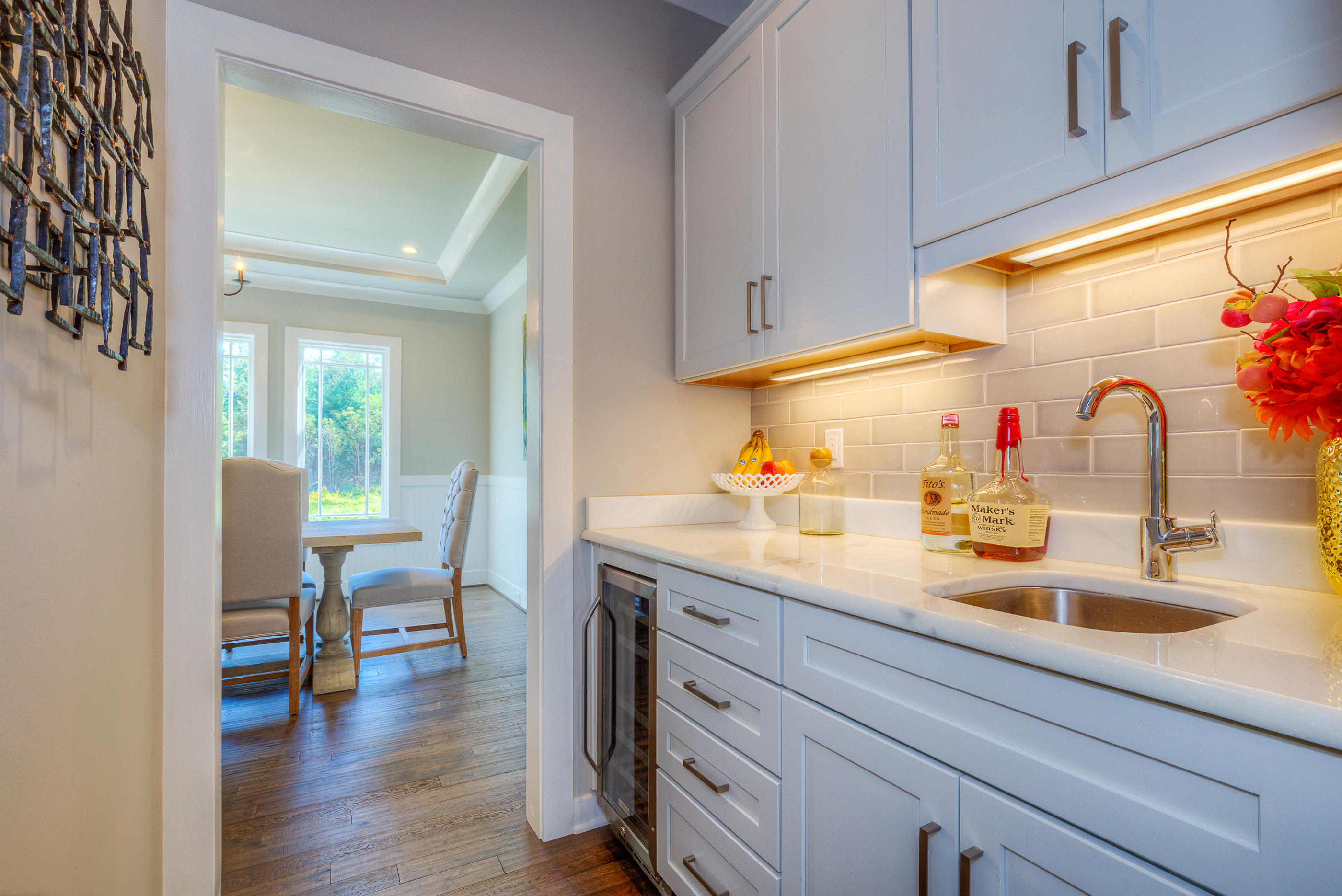 6910 Fairway Ridge Road Salem, VA 24153 - Photo 14 of 46 a kitchen with a sink cabinets and wooden floor