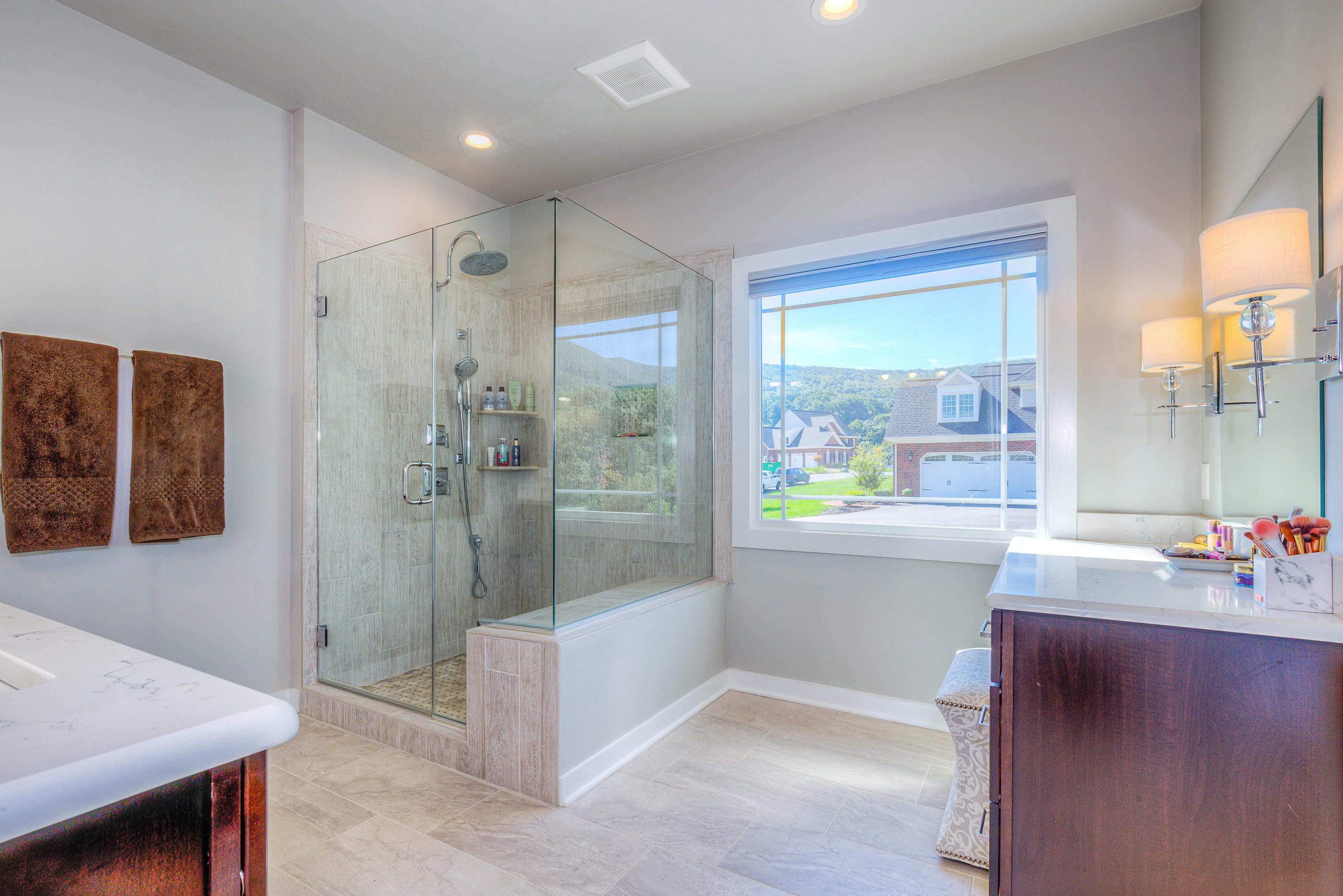 6910 Fairway Ridge Road Salem, VA 24153 - Photo 22 of 46 a bathroom with a tub sink mirror and a shower