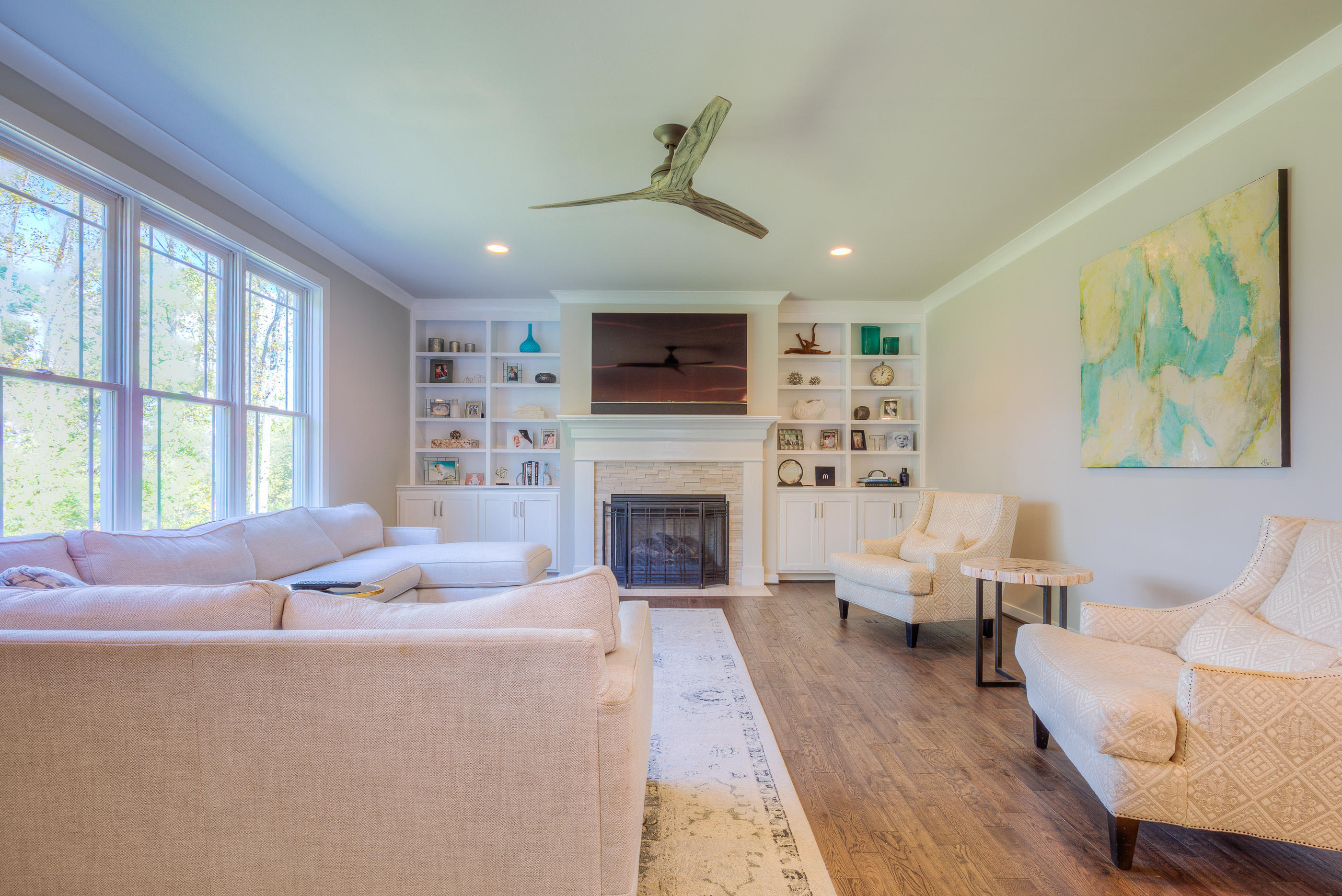 6910 Fairway Ridge Road Salem, VA 24153 - Photo 4 of 46 a living room with furniture a fireplace and a flat screen tv